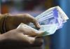 Rupee surges 33 paise to settle  at 85.77 against US dollar