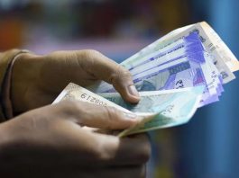 Rupee surges 33 paise to settle  at 85.77 against US dollar