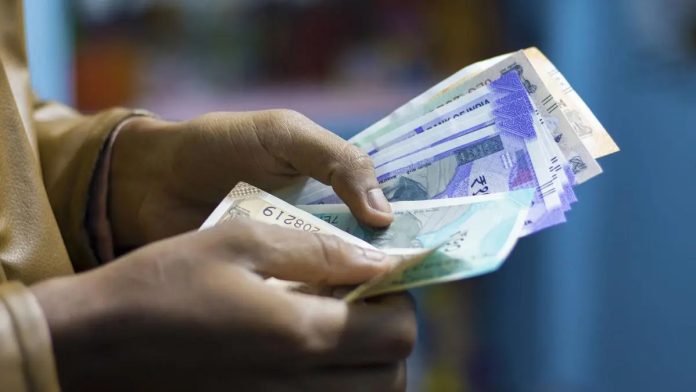 Rupee surges 33 paise to settle  at 85.77 against US dollar