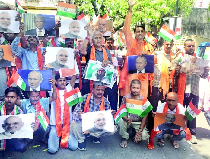 Ashok Gupta along with other members of Dogra Front & Shiv Sena protesting against Pakistan on Monday.