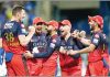 RCB celebrating after defeating MI in a thrilling contest at Mumbai.