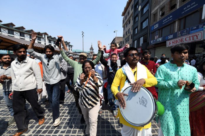 Shoba Yatra being taken out in Srinagar on the occasion of Ram Navmi on Sunday. -Excelsior/Shakeel Shoba Yatra being taken out in Srinagar on the occasion of Ram Navmi on Sunday. -Excelsior/Shakeel