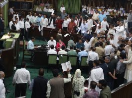 Ruling and Opposition MLAs protesting in the Assembly on Tuesday. -Excelsior/Rakesh