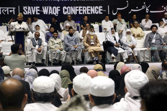 Members of All India Muslim Personal Law Board (AIMPLB) at the Save Waqf Conference at Talkatora Stadium in New Delhi on Tuesday. (UNI)
