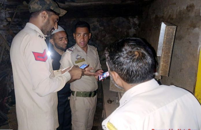 Police personnel during search in the house of a terorist at Bhaderwah on Monday. -Excelsior/Tilak Raj