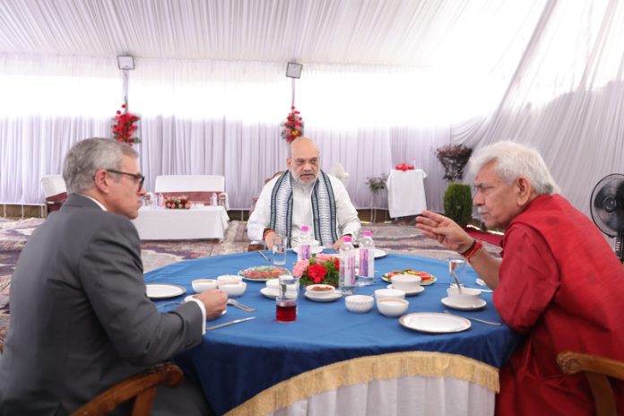Home Minister Amit Shah chairing a meeting in Srinagar on Tuesday. Home Minister Amit Shah chairing a meeting in Srinagar on Tuesday.
