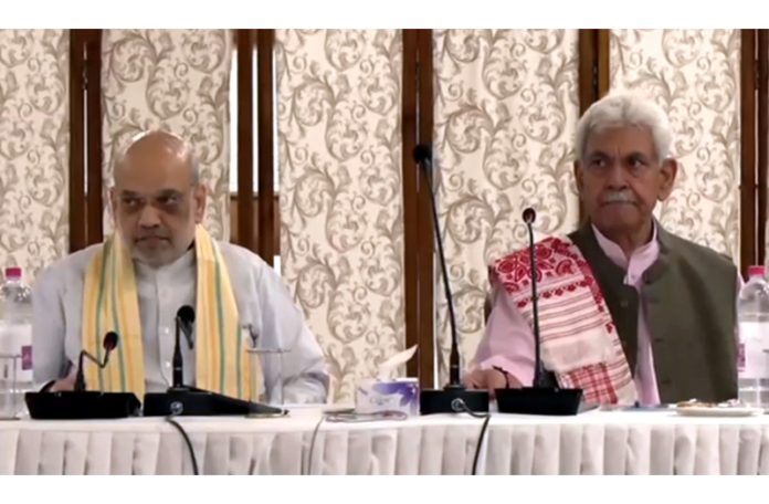 Union Home Minister Amit Shah chairing a security review meeting in Srinagar on Tuesday.