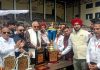 Dr. Farooq Abdullah posing alongwith players and organizers at MA Stadium.