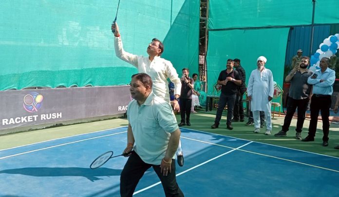 BJP leaders displaying their skills after inaugurating Racket Rush at Akhnoor road Jammu on Sunday.