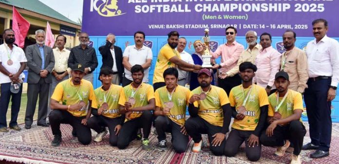 Winning team posing along with trophy at Srinagar. Winning team posing along with trophy at Srinagar.