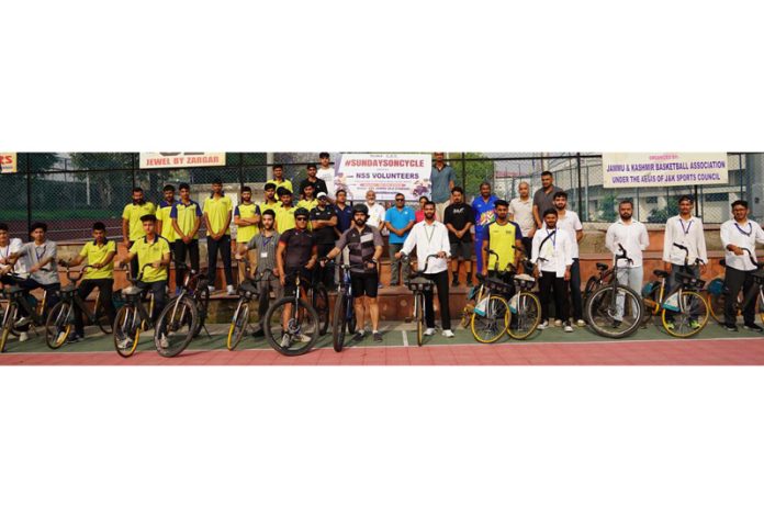 Cyclists posing during 'Sunday Cycling' event at Jammu. Cyclists posing during 'Sunday Cycling' event at Jammu.
