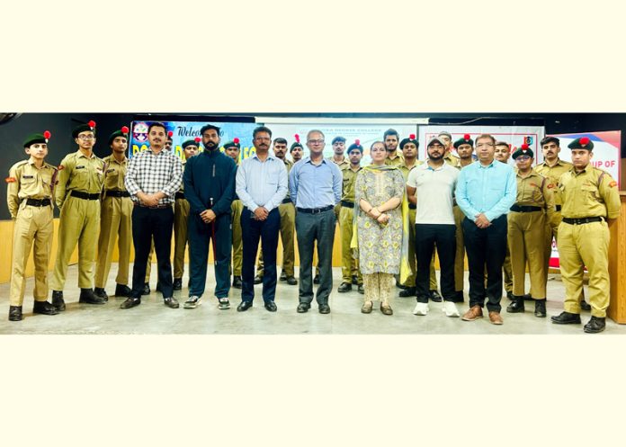 Management of Dogra Degree College, dignitaries and students posing for a group photograph during a program.