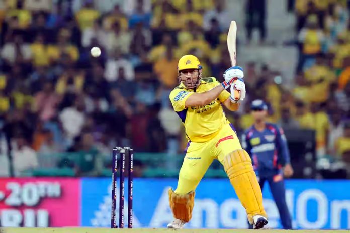 MS Dhoni playing a shot during a match against LSG at Lucknow on Monday.