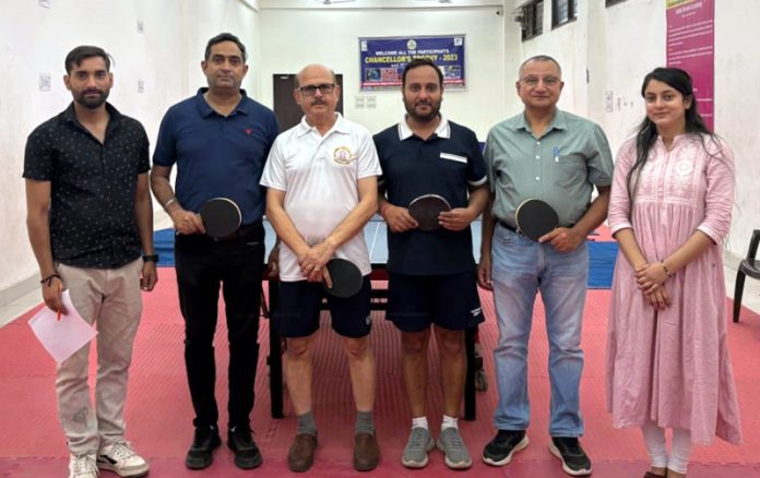Players posing during Table Tennis match at Jammu University.
