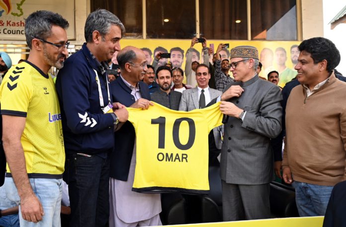 Chief Minister Omar Abdullah receiving a jersey from RKFC management during prize distribution ceremony at TRC Ground, Srinagar on Sunday. Chief Minister Omar Abdullah receiving a jersey from RKFC management during prize distribution ceremony at TRC Ground, Srinagar on Sunday.
