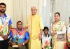 LG Manoj Sinha posing with Arjuna Awardee Para-Archer Rakesh Kumar and National Champion Para-Archer Payal Nag.