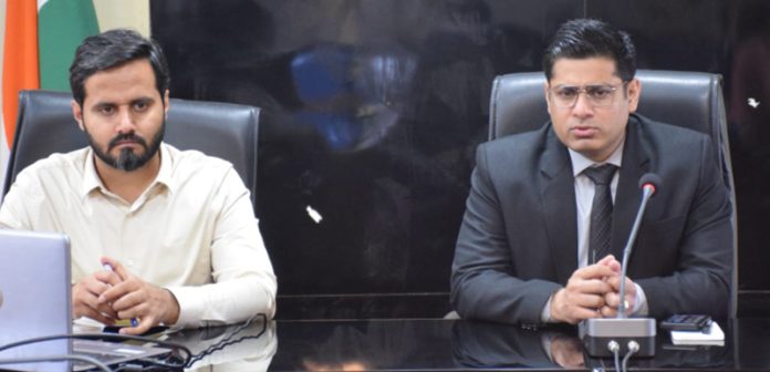 DDC Vikas Kundal chairing a meeting on Saturday.