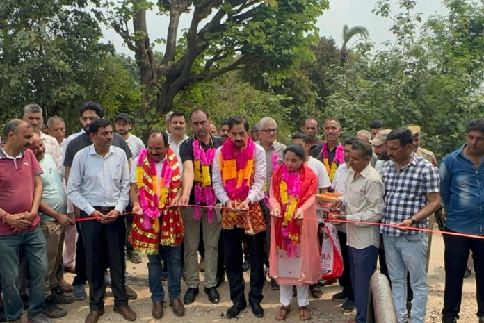 MLA Udhampur West, Pawan Gupta kick starting black topping of road from Sundrani to Dhannu on Wednesday. MLA Udhampur West, Pawan Gupta kick starting black topping of road from Sundrani to Dhannu on Wednesday.