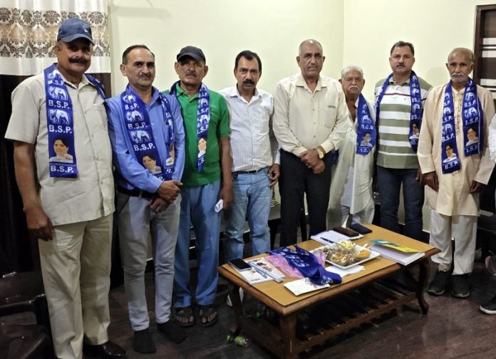 Several people join BSP during a function in Samba on Thursday.