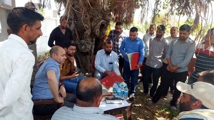 ADM Jammu Rakesh Kumar interacting with people, officials in Akhnoor.