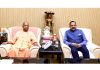 Union Minister Dr Jitendra Singh with UP Chief Minister Yogi Adityanath at his official residence at Lucknow on Monday.