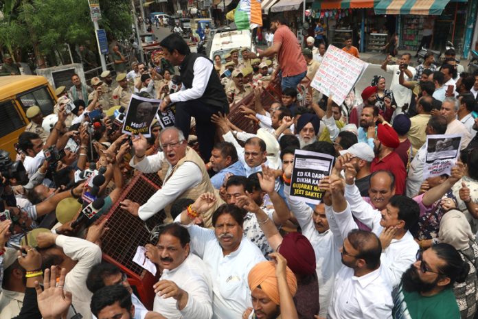 Cong leaders and workers protest march being foiled by police in Jammu on Wednesday. -Excelsior/Rakesh