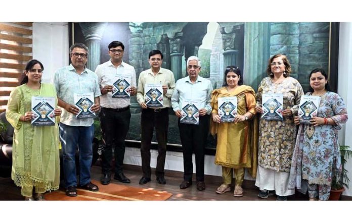 JU Vice-Chancellor & others releasing brochure of DLL on Tuesday.