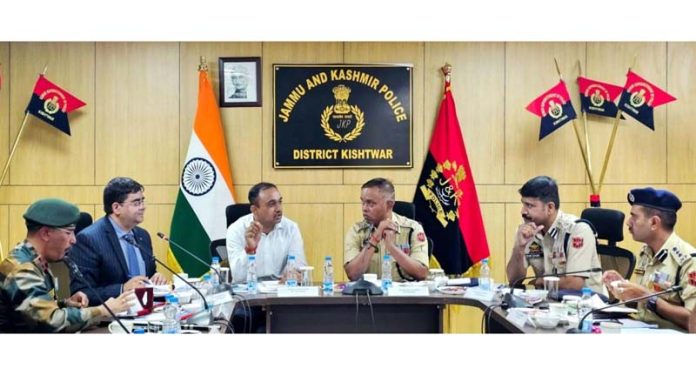 Divisional Commissioner Ramesh Kumar and IGP Bhim Sen Tuti chairing a meeting at Kishtwar on Thursday.