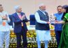 DC Kupwara Ayushi Sudan receiving award from PM.