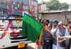Dy CM Surinder Choudhary flagging off bus service from Jammu to Nowshera on Sunday.