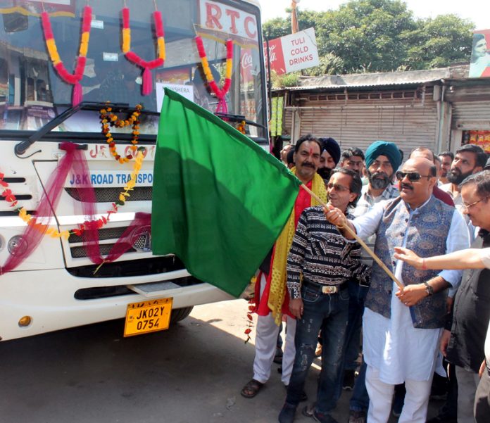Dy CM Surinder Choudhary flagging off bus service from Jammu to Nowshera on Sunday. Dy CM Surinder Choudhary flagging off bus service from Jammu to Nowshera on Sunday.