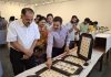 Principal Secretary Culture, Brij Mohan Sharma watching exhibition of rare coins in Jammu.