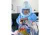 Dr Mohit Arora performing robotic knee replacement surgery on a patient.
