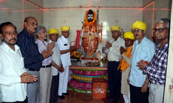 Members of Dogra Brahman Pratinidhi Sabha and others paying obeisance to Bhagwan Parshuram on Tuesday. -Excelsior/Rakesh Members of Dogra Brahman Pratinidhi Sabha and others paying obeisance to Bhagwan Parshuram on Tuesday. -Excelsior/Rakesh