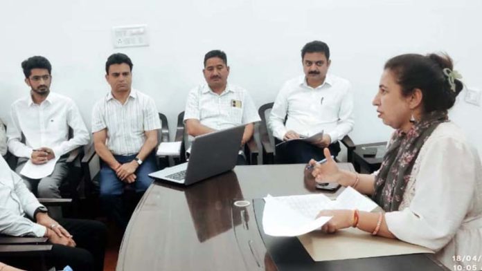 Additional Commissioner, Namrita Dogra chairing a meeting at Udhampur on Friday.