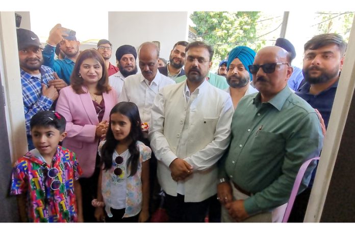 Cabinet Minister Satish Sharma and others during inauguration of a saloon at Gandhi Nagar, Jammu. -Excelsior/Rakesh