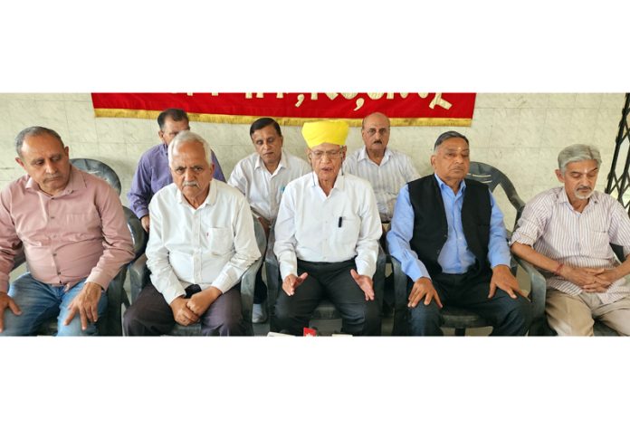 DBPS president talking to media persons at Jammu on Friday. -Excelsior/Rakesh