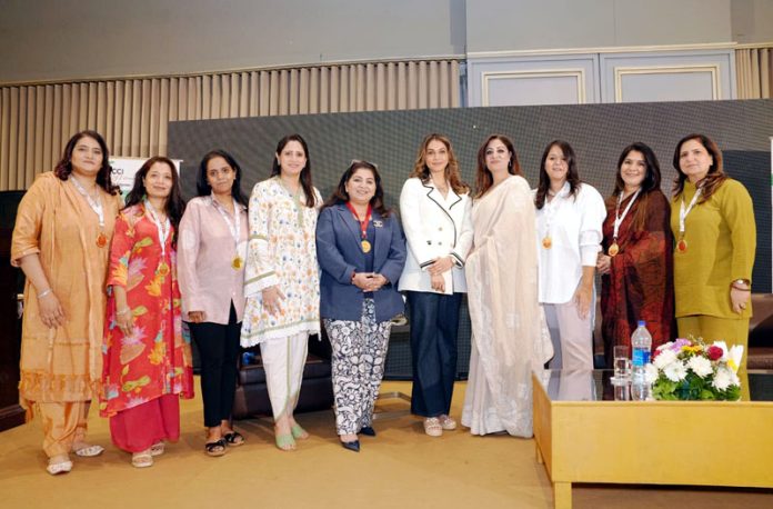 Bollywood actor Isha Koppikar and Dr Hiena Shafi Bhat posing along with others during a function organized in Jammu on Saturday. Bollywood actor Isha Koppikar and Dr Hiena Shafi Bhat posing along with others during a function organized in Jammu on Saturday.