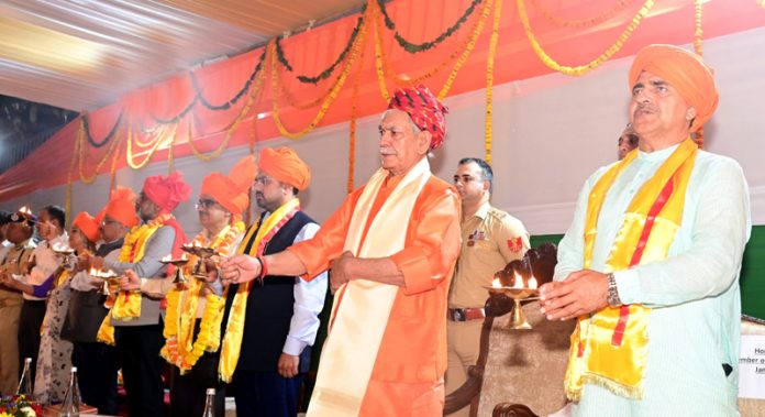LG Manoj Sinha alongwith others performing Tawi Aarti at Tawi River Front in Jammu on Sunday.