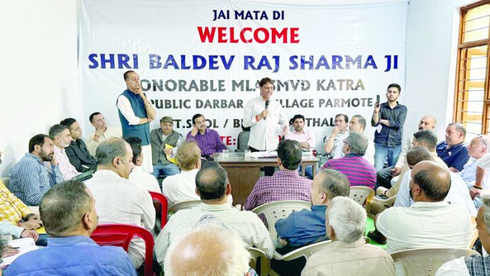 MLA Katra Baldev Sharma interacting with people at Pamote on Friday. MLA Katra Baldev Sharma interacting with people at Pamote on Friday.