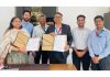 MD JKRLM Shubra Sharma along with J&K Bank's DGM Rakesh Magotra and other officers during signing of an MoU.