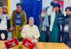 NC president Dr Farooq Abdullah during meeting with a Gujjar delegation at Bandipora.