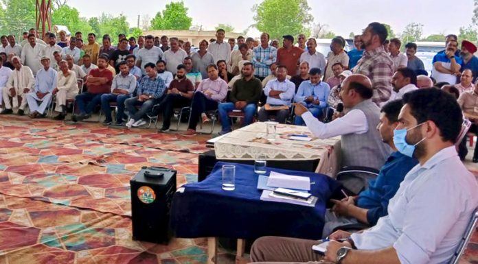 MLA Akhnoor, Mohan Lal, listening to grievances of people during a public darbar at Pargwal.