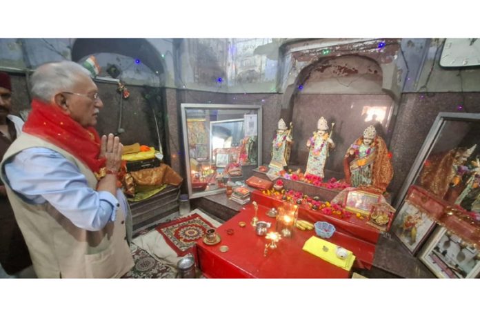 J&K Dharmarth Trust president, Dr P S Pathania paying obeisance at ancient Raghunathji Temple in Suchetgarh.