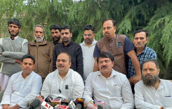 Shiv Sena leaders at a press conference at Srinagar on Saturday.