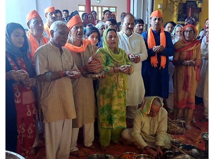 The volunteers of Nandraaz Temple Trust Ashmuji solemnising a Maha Yagya at Mahesh Bharti Ashram Muthi Jammu.