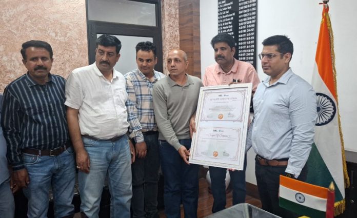 CHC Poonch officials receiving the certificate.