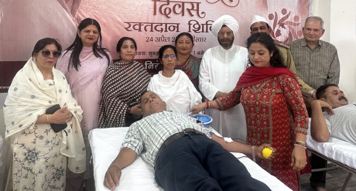 A volunteer donating blood during a camp organised by Sant Nirankari Mission in Jammu on Thursday. A volunteer donating blood during a camp organised by Sant Nirankari Mission in Jammu on Thursday.