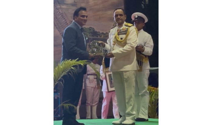 Vice Admiral V Srinivas, Flag Officer Commanding-in-Chief, Southern Naval Command felicitating Sandeep Gupta on Friday.