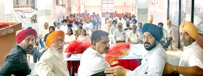 JKMM president Ranjodh Singh Nalwa along with senior BJP leaders Charanjit Singh Khalsa and Pramod Kapahi during a function at Gangyal, Jammu.